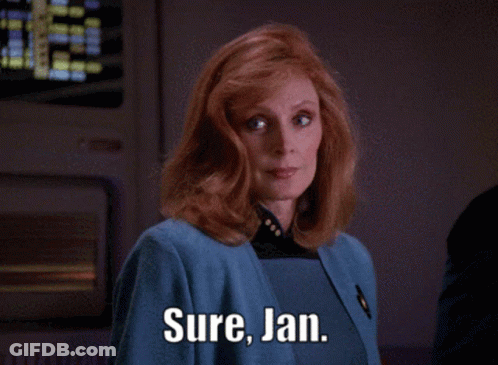 Woman With Red Hair Saying Sure Jan GIF