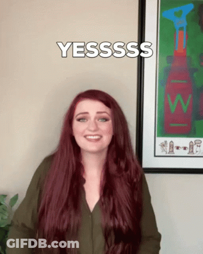 Woman With Red Hair Saying Yesssss GIF