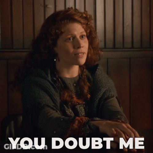 Woman With Red Hair Sitting You Doubt Me GIF