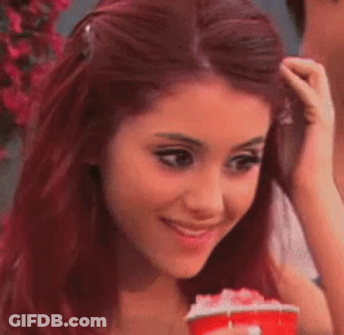 Woman With Red Hair Smiling Holding Coffee GIF