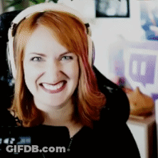 Woman With Red Hair Smiling In Headphones GIF