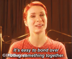Woman With Red Hair Smiling Says Its Easy To Bond Over Hating Something Together GIF