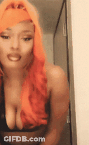 Woman With Red Hair Wearing Black Bra GIF