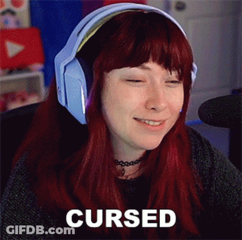 Woman With Red Hair Wearing Headphones Smiling Cursed GIF