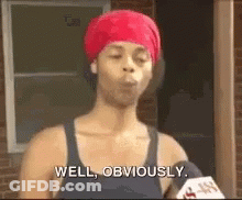 Woman With Red Headband Talking Into Microphone GIF