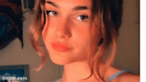 Woman With Red Lips And Blue Tank Top GIF