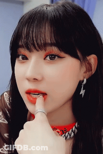 Woman With Red Lips And Ring GIF