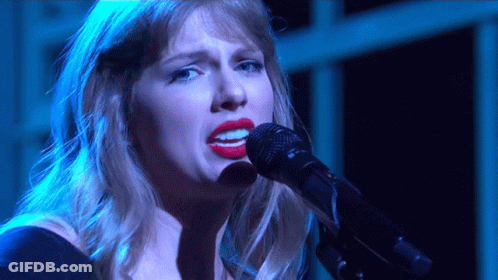 Woman With Red Lips Singing Into Microphone GIF