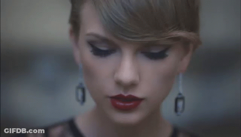 Woman With Red Lipstick And Black Earrings GIF