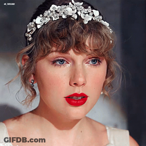 Woman With Red Lipstick And Taylor Headband GIF