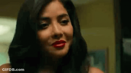 Woman With Red Lipstick Looking At Camera GIF