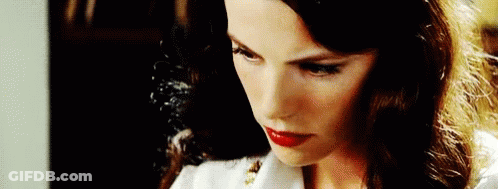 Woman With Red Lipstick Looking Down GIF