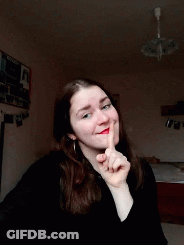 Woman With Red Lipstick Smiling Making Funny Face GIF