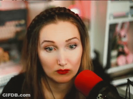Woman With Red Lipstick Talking Into Microphone GIF