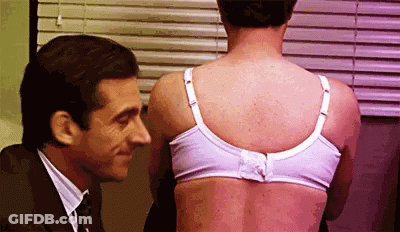 Woman With Red Nails Adjusting Black Bra Straps GIF