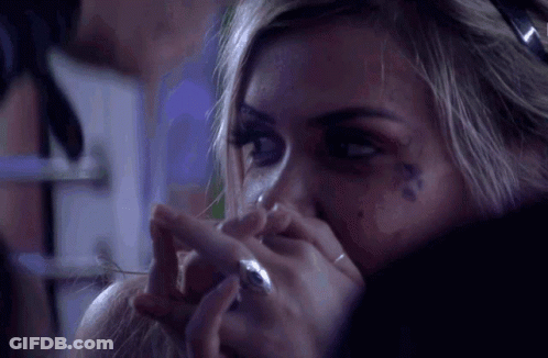 Woman With Ring Covering Mouth GIF