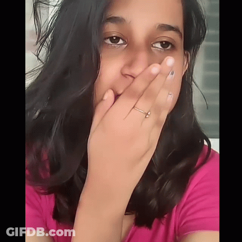 Woman With Ring Covering Mouth GIF