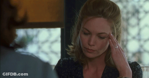 Woman With Ring Holding Head GIF