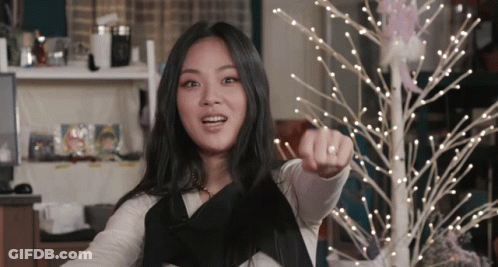 Woman With Ring Pointing At Camera GIF