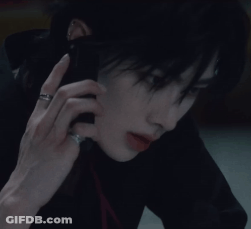 Woman With Ring Talking On Cell Phone GIF