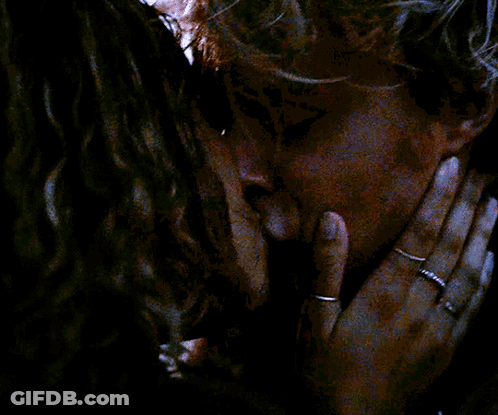 Woman With Rings Kissing Another Woman On Forehead GIF