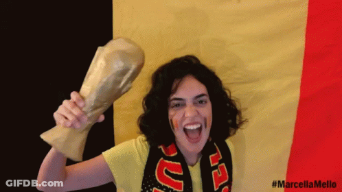 Woman With Scarf Letter U Holding Trophy GIF