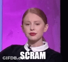Woman With Scram On Face, Purple Background GIF