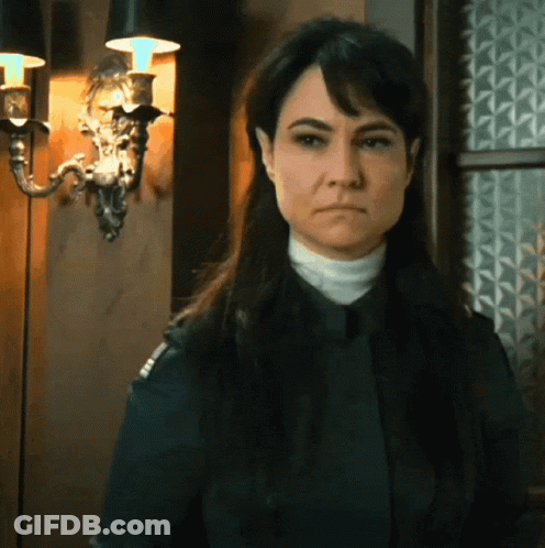 Woman With Serious Look GIF
