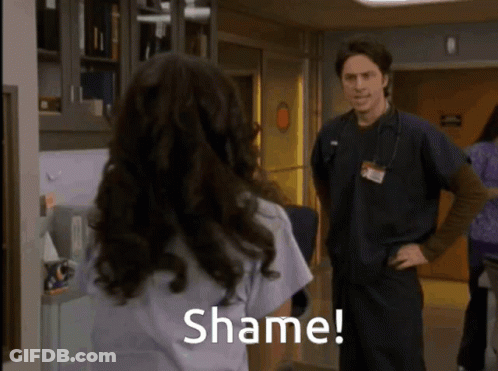 Woman With Shame Shirt In Front Of Man GIF