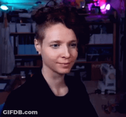 Woman With Shaved Head Smiling GIF