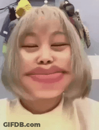 Woman With Short Blonde Hair Making Funny Face GIF
