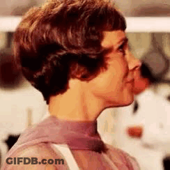 Woman With Short Hair And Bra GIF