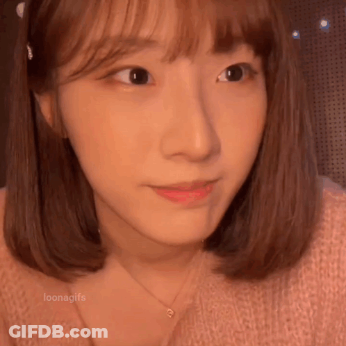 Woman With Short Hair And Necklace GIF