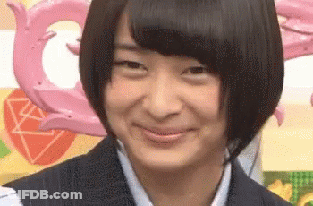 Woman With Short Hair And Pink Balloon GIF