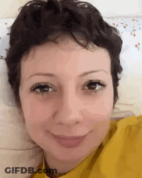 Woman With Short Hair And Yellow Shirt GIF