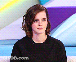 Woman With Short Hair In Black Top GIF