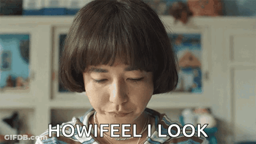 Woman With Short Hair Making A Face Saying How Feel I Look GIF
