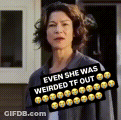 Woman With Sign Saying Even She Was Weirded TF Out GIF