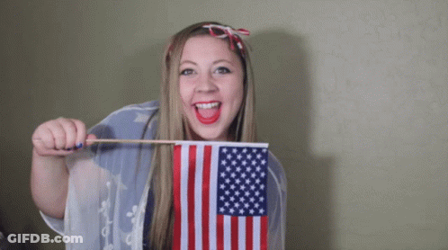 Woman With Small American Flag GIF