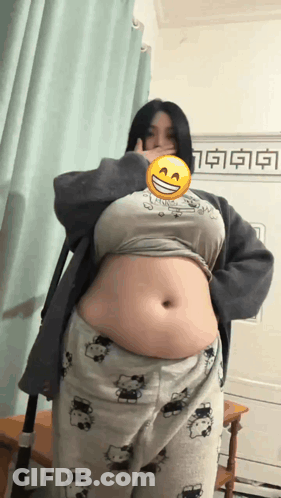 Woman With Smiley Face Showing Belly GIF