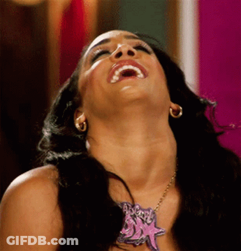 Woman With Starfish Necklace Laughing GIF