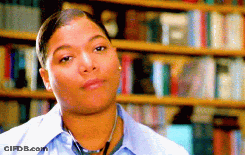 Woman With Stethoscope In Front Of Bookshelf GIF
