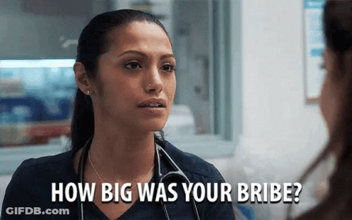 Woman With Stethoscope Talking To Another In Hospital GIF