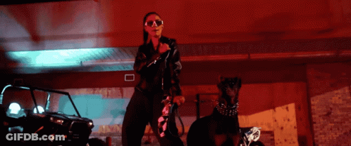 Woman With Sunglasses And Dog On Leash By Jeep GIF