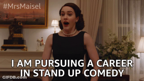 Woman With Surprised Look Pursuing Career In Stand Up Comedy GIF