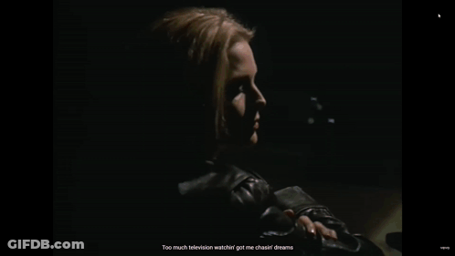 Woman With Tan And Gleam In Eye GIF