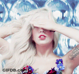 Woman With Tattoo Covering Eyes GIF