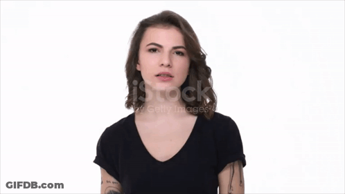 Woman With Tattoo Flexing Muscles GIF