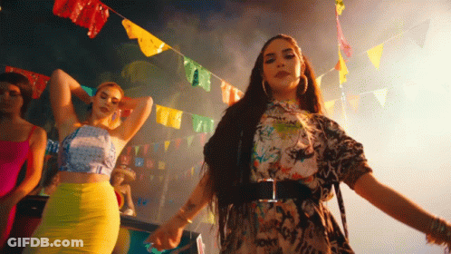 Woman With Tattoo On Arm Dancing GIF