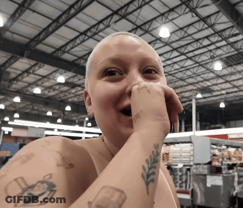 Woman With Tattoo Saying A GIF
